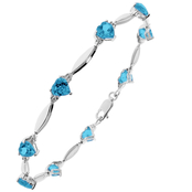 Sterling Silver Blue Topaz Birthstone Bracelet with Diamond Accents - December
