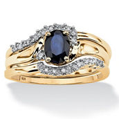 PalmBeach 1.05 TCW Oval-Cut Midnight Sapphire Ring Set in Gold-Plated Silver