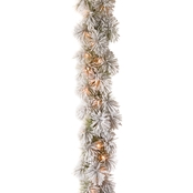 National Tree Co. 9 Ft. Snowy Bristle Pine Garland with Clear Lights