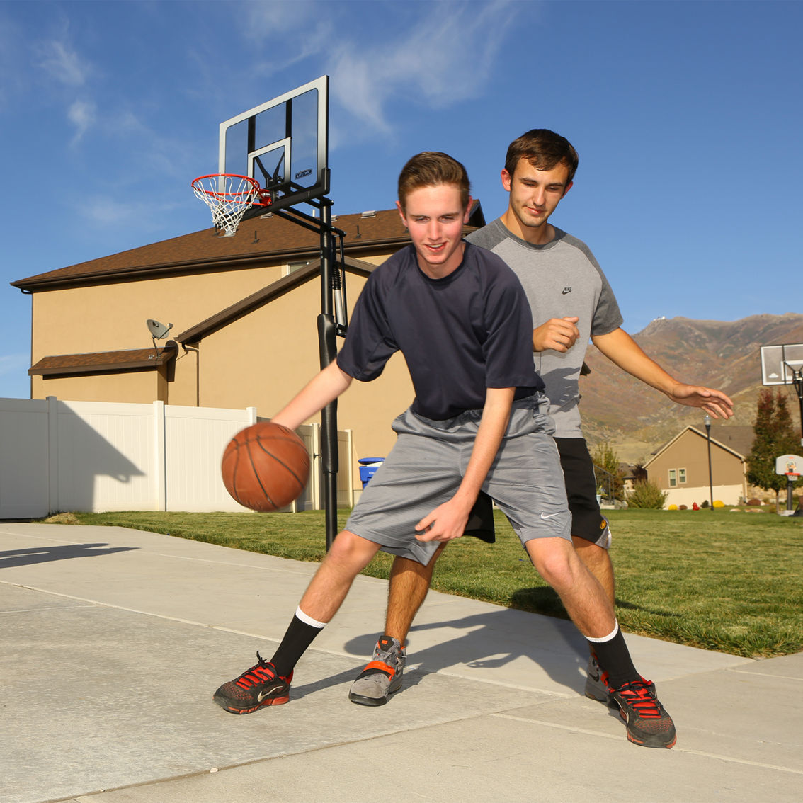 Lifetime Adjustable In-Ground Polycarbonate Basketball Hoop with 52 in. Backboard - Image 8 of 10