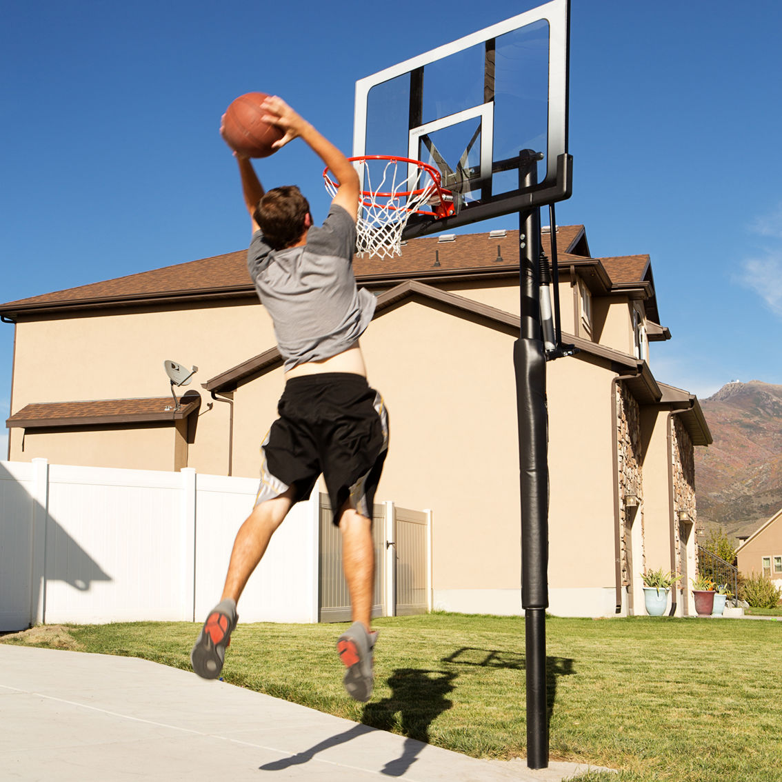 Lifetime Adjustable In-Ground Polycarbonate Basketball Hoop with 52 in. Backboard - Image 10 of 10